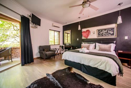 Ένα ή περισσότερα κρεβάτια σε δωμάτιο στο Zebrina Guest House
