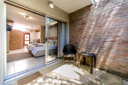Ένα ή περισσότερα κρεβάτια σε δωμάτιο στο Zebrina Guest House