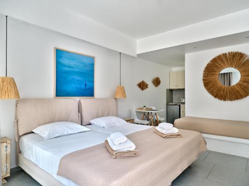 Posteľ alebo postele v izbe v ubytovaní Corina Studios-Apartments