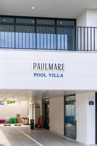 a building with a sign that reads paul membrane pool villa at Paul Mare Pool Villa in Busan