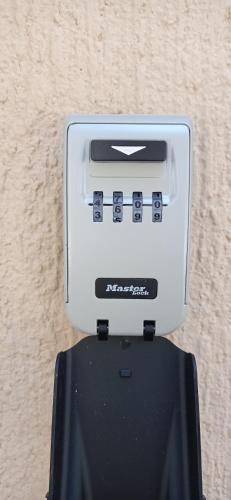 a white toaster sitting on top of a table at Angela's Seaside Luxury Flat in Lefkandi Chalkidas