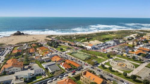 an aerial view of a town next to the beach at Holiday Inn Porto Gaia by IHG in Vila Nova de Gaia