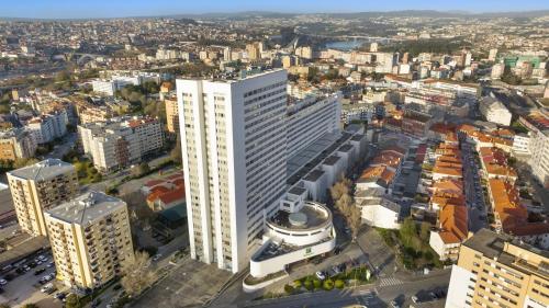 an aerial view of a city with tall buildings at Holiday Inn Porto Gaia by IHG in Vila Nova de Gaia