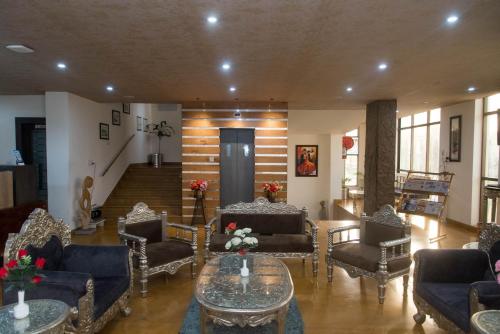 Un lugar para sentarse en Raghu Mahal Hotel
