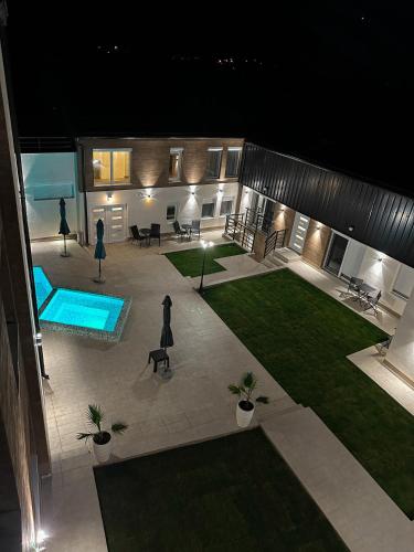 an aerial view of a courtyard with a swimming pool at GOLDEN VIEW Sokobanja in Soko Banja