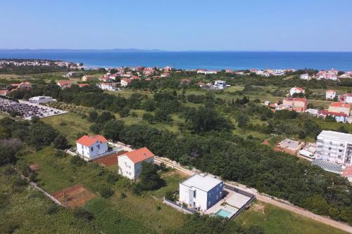 an aerial view of a city and the ocean at App 5 Zaton beach Sonnenterrasse Fußbodenheizung einzigartig auch im Herbst und Winter in Zaton