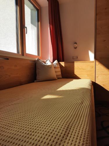 Cama o camas de una habitación en Valbella Appartements