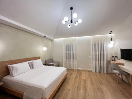 Postel nebo postele na pokoji v ubytování Elpis Guest House