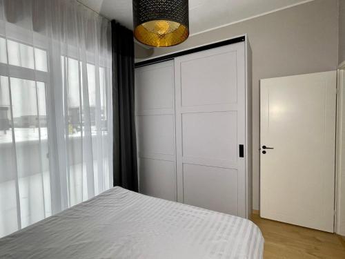 Postel nebo postele na pokoji v ubytování Lehe Premium Apartment