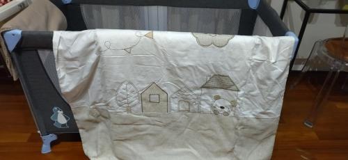 a white bag with a picture of a house at Pantheon Grand Suite in Rome