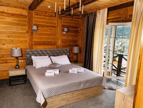 Postel nebo postele na pokoji v ubytování SVOI Hotel