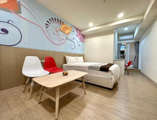 Ένα ή περισσότερα κρεβάτια σε δωμάτιο στο Music City Inn