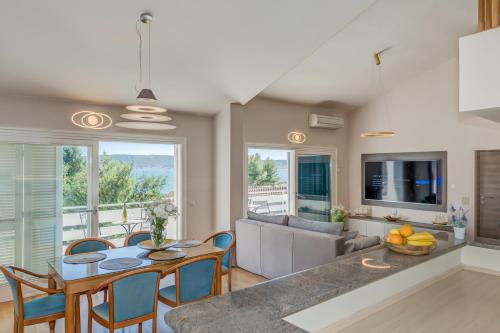 Η κουζίνα ή μικρή κουζίνα στο Beach Residence Parat