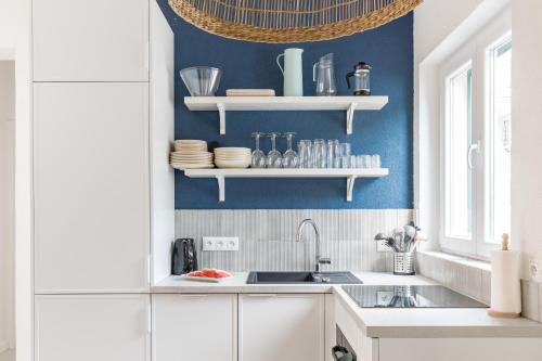 Kuchyň nebo kuchyňský kout v ubytování Apartments Marina