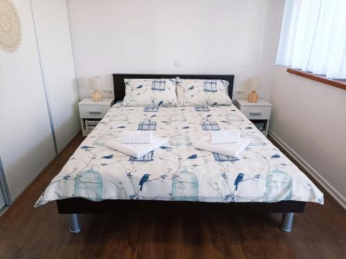 Ein Bett oder Betten in einem Zimmer der Unterkunft Vacation House Rosa