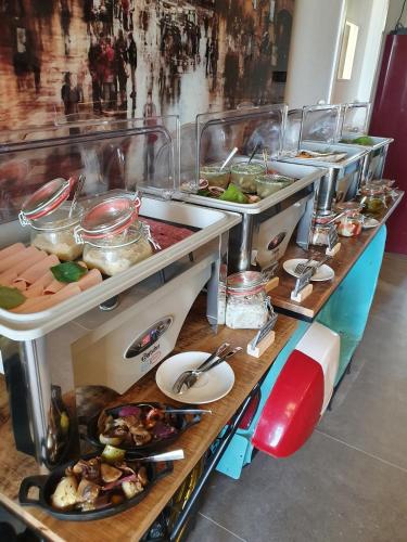 a buffet line with many different types of food at SEA YOU in Klink