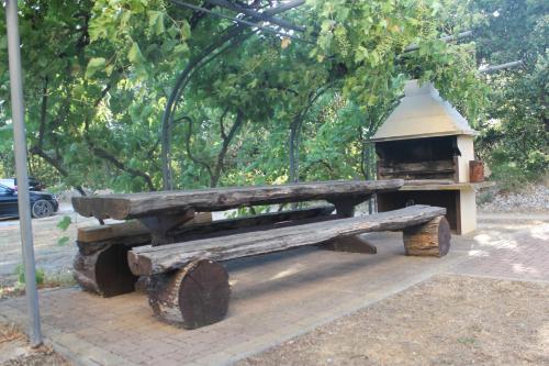 a wooden bench with a bird house on it at App 5 Zaton beach Sonnenterrasse Fußbodenheizung einzigartig auch im Herbst und Winter in Zaton