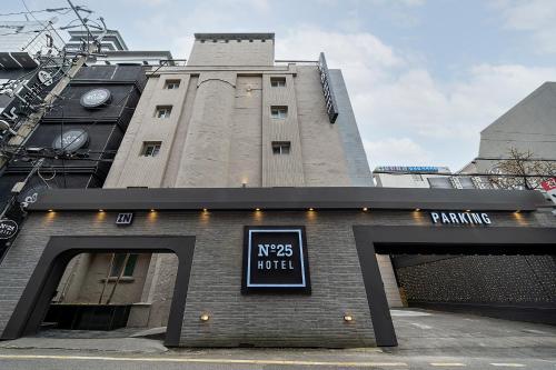 a building with a sign on the front of it at No25 Hotel Bupyeong in Incheon