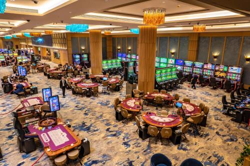 an image of a casino with poker tables at The Arkin Iskele in Iskele