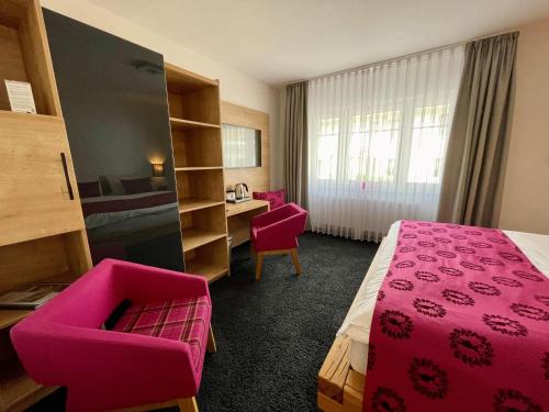 Кровать или кровати в номере NaturBoutique Hotel RAUSZEIT
