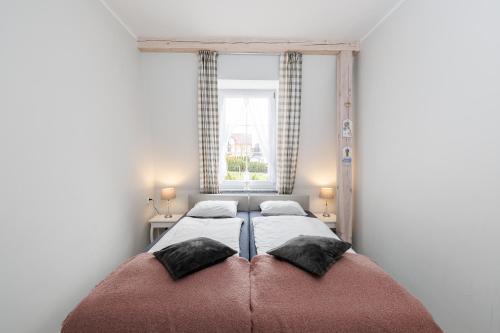Katil atau katil-katil dalam bilik di Apartament Prowansalski