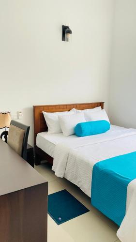 Postel nebo postele na pokoji v ubytování Luxe Highway Residencies