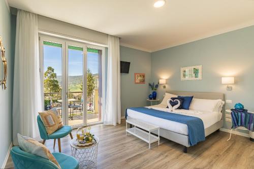 Posteľ alebo postele v izbe v ubytovaní B&B La Cornice
