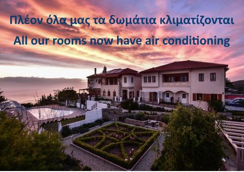 a picture of a house with the words new ahmad use to subaru k at Lagou Raxi Country Hotel in Lafkos