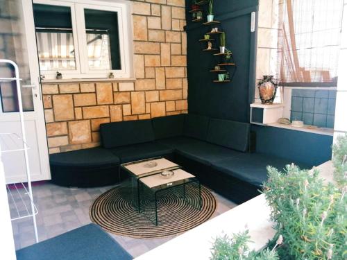 Ruang duduk di Palmera Apartment