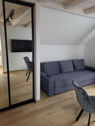 Χώρος καθιστικού στο Nendrės apartamentai