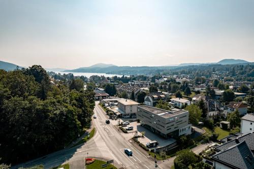 an aerial view of a city with a street at Hotel Kärntnerhof Velden by S4Y in Velden am Wörthersee