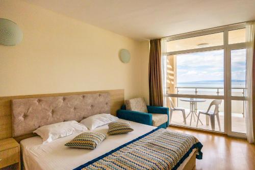 Postel nebo postele na pokoji v ubytování Royal Bay Resort - All Inclusive and Free beach accsess
