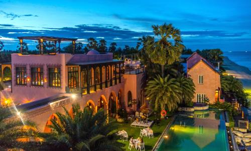 an aerial view of a house with a swimming pool at Villa Maroc Resort in Pran Buri