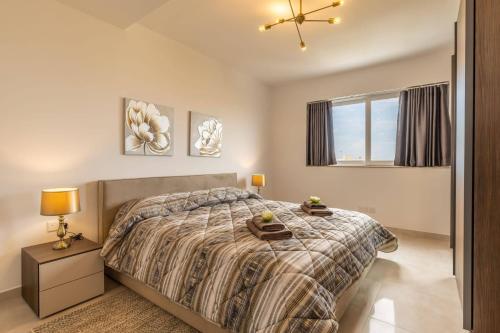 Ένα ή περισσότερα κρεβάτια σε δωμάτιο στο Dome Sunset Views Apartment