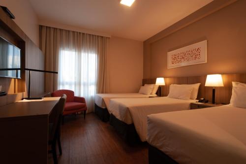 Radisson Hotel Anápolisにあるベッド
