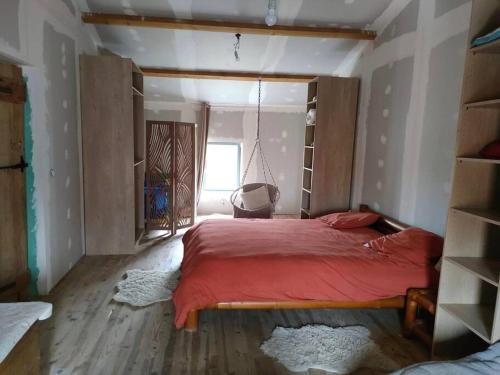 Postel nebo postele na pokoji v ubytování Gîte la roche paisible