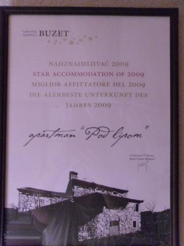 a picture of a building in a picture frame at Apartment Pod Lipom in Roč