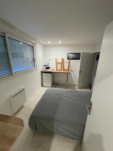 En eller flere senge i et værelse på chambre etage fonctionnelle et independante