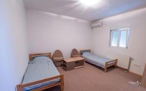 Cama o camas de una habitación en Apartments Fusion