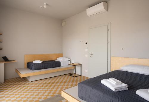 Cama o camas de una habitación en 'RE-Dama Hostel