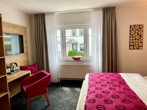 Кровать или кровати в номере NaturBoutique Hotel RAUSZEIT