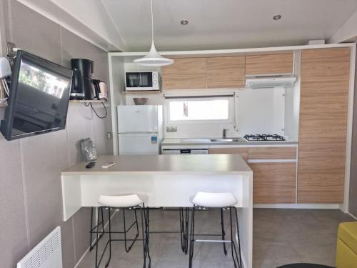 Location d'un mobil-home de 35 m² au Camping Les Sables d'Or - 4 étoiles avec grand parc aquatique