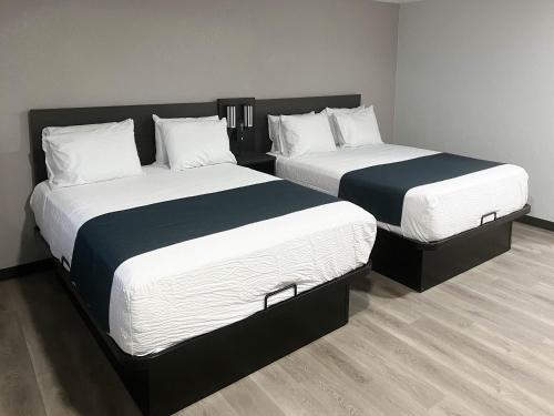Katil atau katil-katil dalam bilik di Motel 6 Brighton CO Denver Northeast