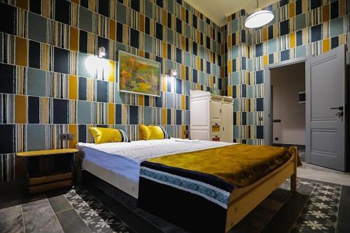 Ein Bett oder Betten in einem Zimmer der Unterkunft Cuib Complex Turistic