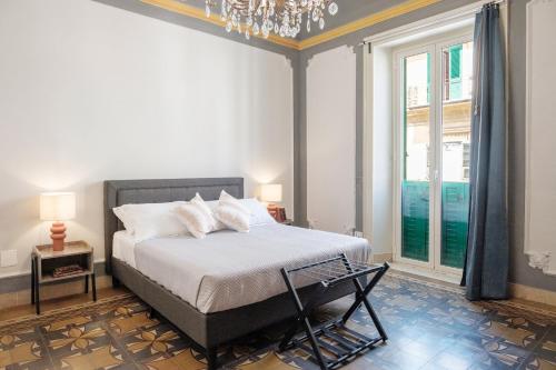 Postel nebo postele na pokoji v ubytování Borgo Antico Rooms