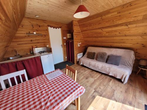 A seating area at Camping les Hirondelles