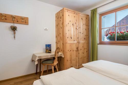 Ένα ή περισσότερα κρεβάτια σε δωμάτιο στο Montis Moarhof Natur Apartments