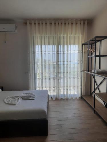 Ένα ή περισσότερα κρεβάτια σε δωμάτιο στο Devi's Apartment