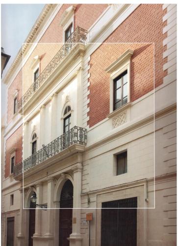 a picture of a building with a brick building at Central Gallery Rooms- Palazzo D'Ali' Staiti XIX in Trapani