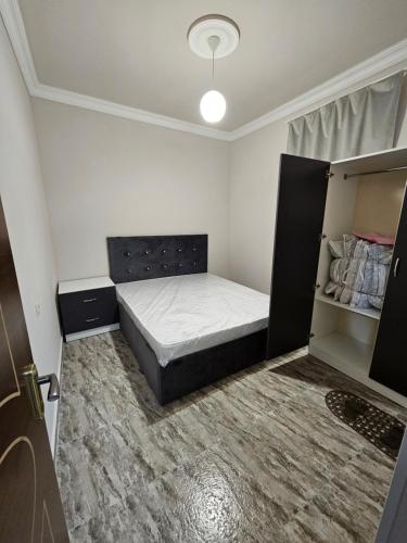 Postel nebo postele na pokoji v ubytování Туристический Дом в EVN Airport